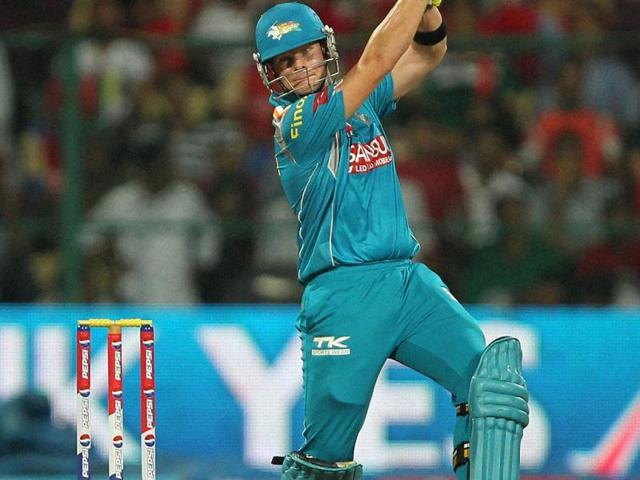 Pune Warriors' S Smith plays a shot during the T20 match against RCB at Chinnaswamy Stadium in Bangalore. (PTI)