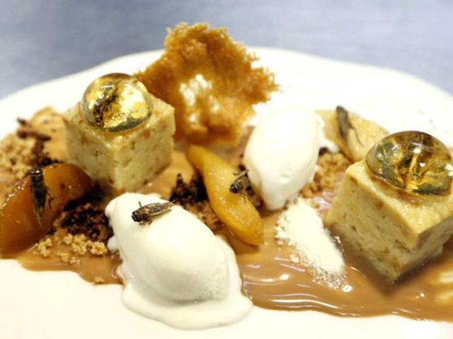 Picture taken in Nice, southeastern France, of a dessert "Inclusion de grillons en bubble au whisky", prepared by French Michelin-starred Chef David Faure at his restaurant "Aphrodite". Chef David Faure proposed dishes composed with worms and crickets. (AFP)