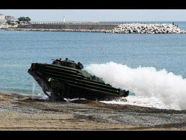 A US Marine amphibious assault vehicle sails to shores during the US-South Korea joint military exercises called Ssangyong 2013 as part of their two-month-long Foal Eagle military exercises in Pohang, south of Seoul, South Korea. AP Photo