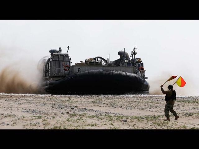 US Navy's Landing Craft Air Cushion arrives on the beach during the US-South Korea joint military exercises called Ssangyong 2013 as part of their two-month-long Foal Eagle military exercises in Pohang, south of Seoul, South Korea. AP Photo