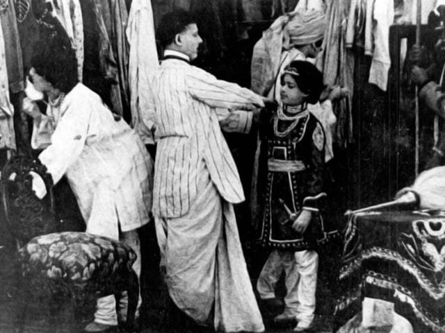 Dadasaheb-Phalke-gets-his-son-ready-for-the-shooting-of-Raja-Harishchandra-1913-Dadasaheb-s-son-Bhalachandra-D-Phalke-essayed-the-role-of-Rohtash-son-of-Raja-Harischandra-Raja-Harishchandra-was-India-s-first-feature-film