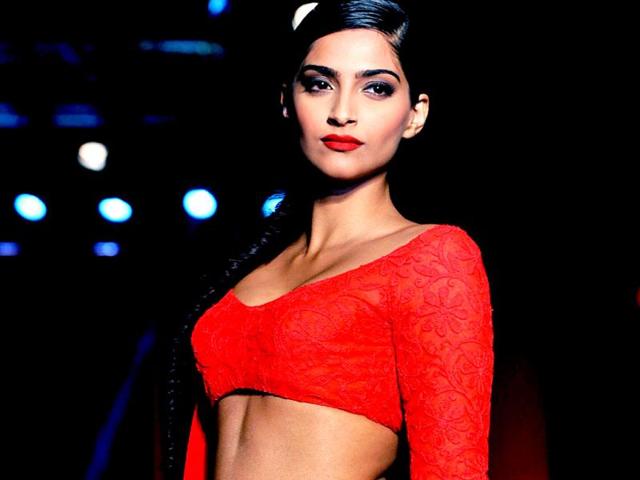 Sonam Kapoor nailed it in a red ensemble created by Manish Malhotra during a product launch in Mumbai on April 25. AFP Photo