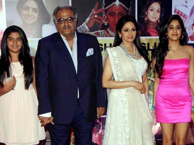 Sridevi (2nd R) with husband Boney Kapoor (2nd L) pose with their daughters Jhanvi and Kushi during a promotional event in Mumbai on April 23, 2013. (AFP Photo)