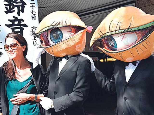 Members of the Japanese performance group Medaman-Medaman performs in Tokyo at the annual street performance festival. (AFP Photo)