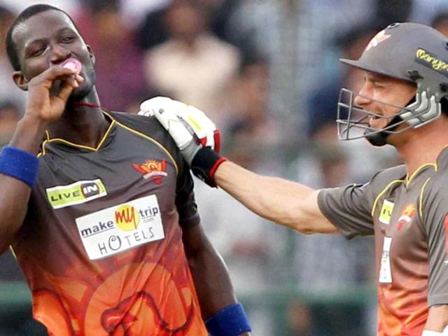 Sunrisers Hyderabad batsman D Sammy shares a light moment on scoring 50 runs against Rajasthan Royals during the T20 match in Jaipur. PTI