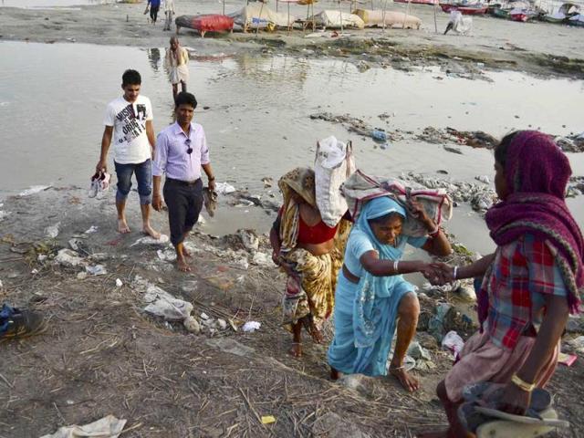 Banks of River Ganga filled with garbage at Sangam in after the devotees left the sacred river polluted during the Kumbh Mela festival in Allahabad. (Sheeraz Rizvi/HT)