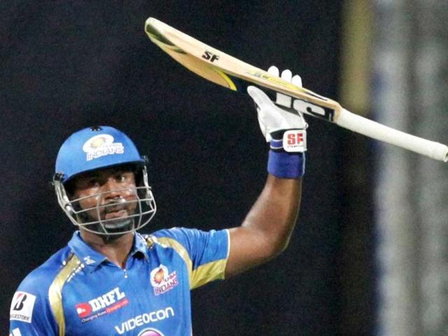 Mumbai Indians batsman D Smith celebrates his half-century against Royal Challengers Bangalore during the T20 League match in Mumbai. PTI photo