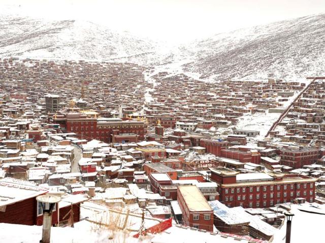 There are hundreds of small houses where monks and nuns live at Seda Monastery, the largest Tibetan Buddhist school in the world, with up to 40,000 monks and nuns in residence for some parts of the year. (AFP)