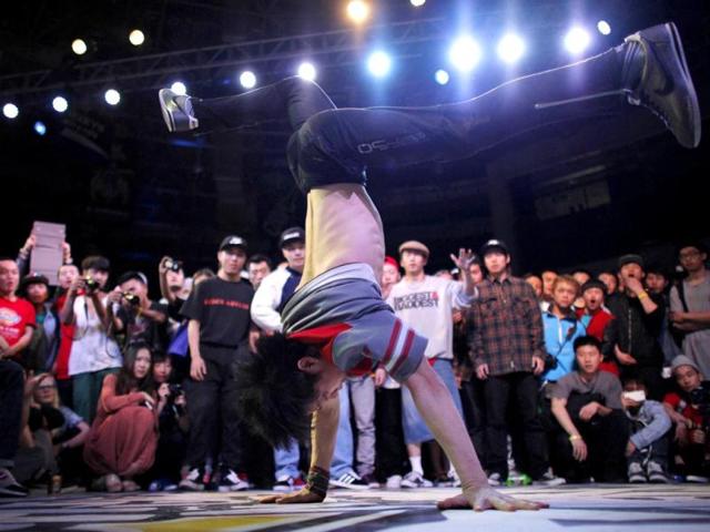 A dancer performs during the 2013 B-BOY Shanghai breakdancing competition in Shanghai. Reuters