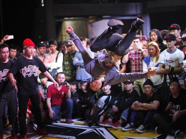 A dancer performs during the 2013 B-BOY Shanghai breakdancing competition in Shanghai. Reuters