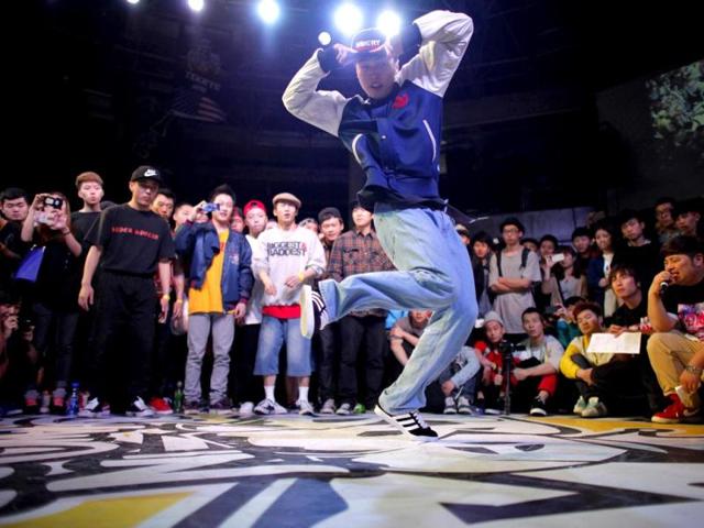 A dancer performs during the 2013 B-BOY Shanghai breakdancing competition in Shanghai. Reuters