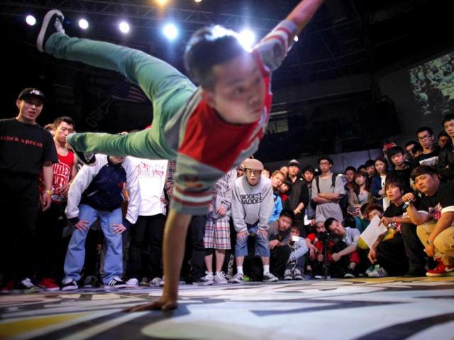 A dancer performs during the 2013 B-BOY Shanghai breakdancing competition in Shanghai. Reuters