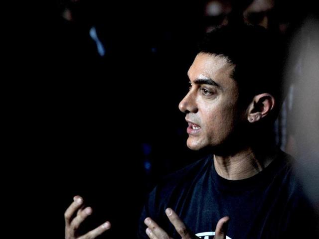 Aamir Khan chats with the media during the event. AFP Photo
