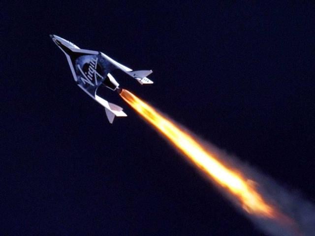 Virgin Galactic's SpaceShip Two flies over the Mojave Desert in California in this handout provided by Griffin Communications Group. (Reuters)