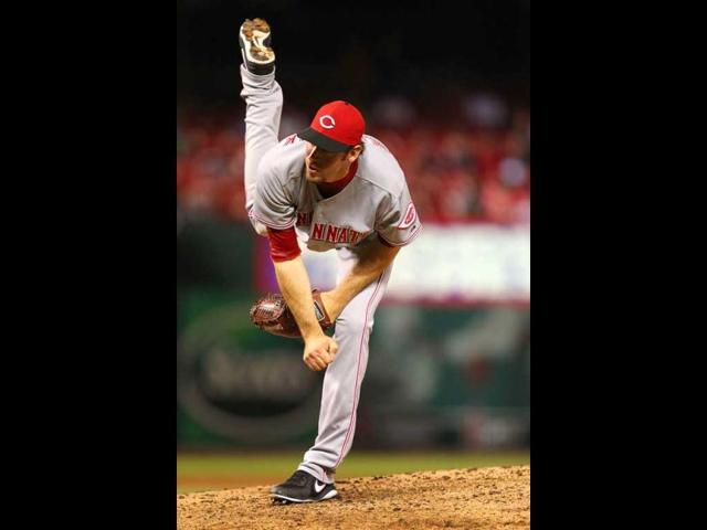 Reliever Logan Ondrusek #66 of the Cincinnati Reds pitches against the St. Louis Cardinals at Busch Stadium in St. Louis, Missouri. (AFP)