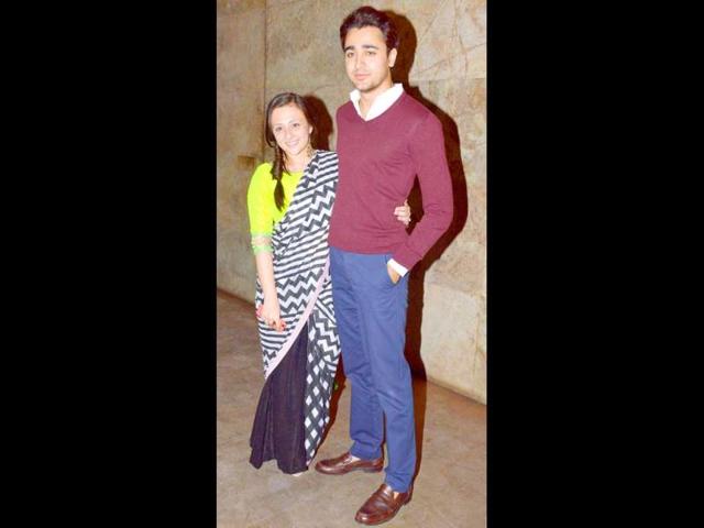 Imran Khan poses in a white shirt and dark blue pants with wife Avantika. (Photo/Yogen Shah)