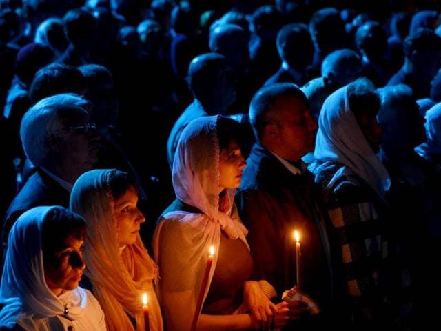 Russian Orthodox believers celebrate Easter at the Christ the Savior Cathedral in Moscow. AFP