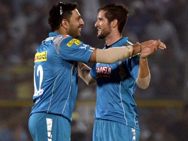 Pune Warriors India Yuvraj Singh celebrates the wicket of Rajasthan Royals batsman Shane Watson during the T20 league match at Swai Mansingh Stadium in Jaipur. (Mohd Zakir/HT)
