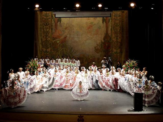 Michelle Barrios (front centre), 8, in a traditional dress known as Pollera, is seen after winning the juvenile category during the National Pollera Contest at the National Theater in Panama City. Reuters photo