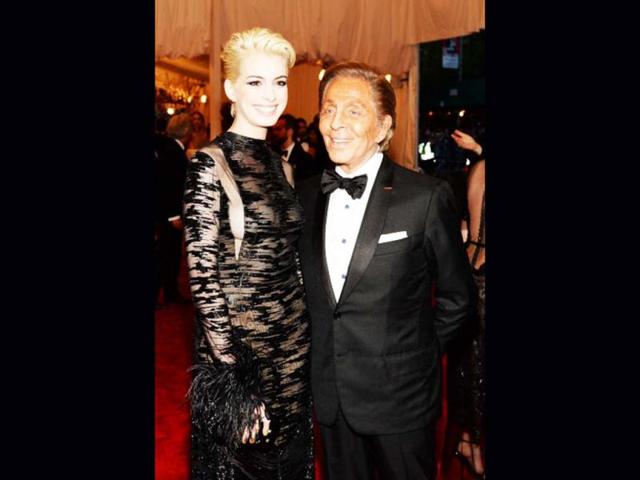 Actress Anne Hathaway and designer Valentino Garavani attends the Costume Institute Gala for the "PUNK: Chaos to Couture" exhibition at the Metropolitan Museum of Art on May 6, 2013 in New York City. (Getty Images)