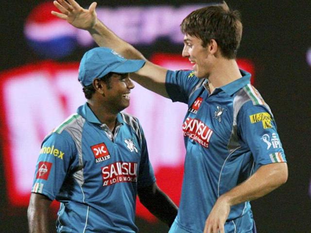 Pune Warriors players celebrate the dismissal of KKR's batsman Gautam Gambhir during a T20 match in Pune. (PTI)