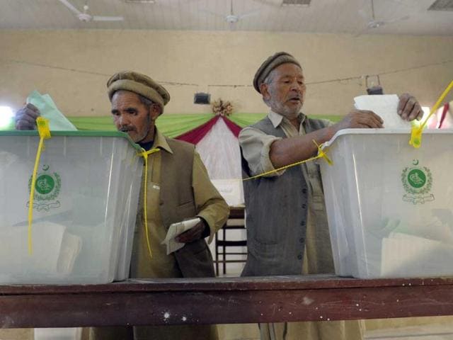 Pakistani Hazara Shiite community members cast their votes at a polling station in Quetta. AFP photo