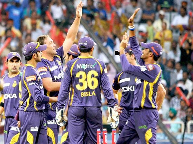 Kolkata Knight Riders players celebrate Banglore batsman Chris Gayle's during their T20 League match at JSCA International Stadium Complex, Ranchi. (PTI Photo)