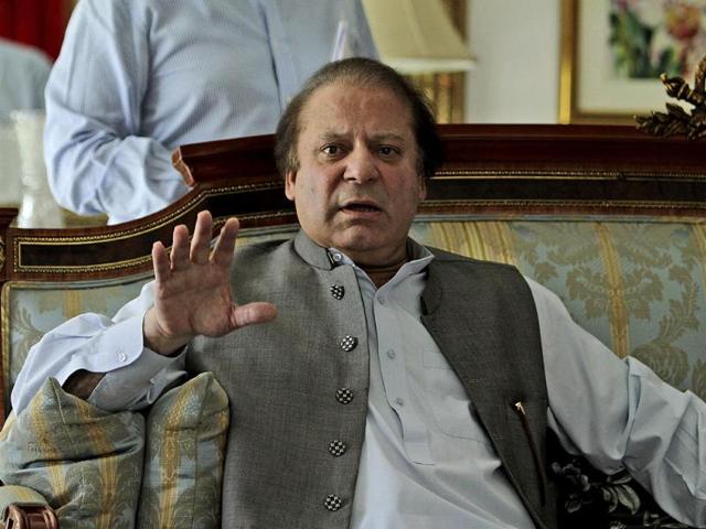 Leader-of-Pakistan-Muslim-League-N-party-Nawaz-Sharif-gestures-while-speaking-to-members-of-the-media-at-his-residence-in-Lahore-AP-KM-Chaudary