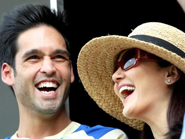 Royal Challengers Bangalore owner Siddharth Mallya shares a laugh with Kings XI Punjab co-owner Preity Zinta during the T20 match at Chinnaswamy Stadium in Bengaluru. (PTI Photo)