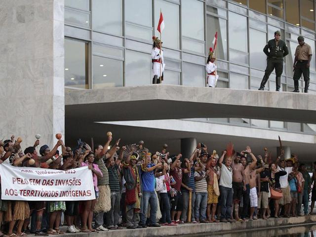 Indigenous Indians occupy the entrance of the Planalto Palace, during a protest against demarcation of indigenous lands and reserves in Brazil, in Brasilia. (Reuters)