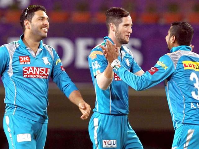 Pune Warriers cricketer Yuvraj Singh celebrates their win with teammates the T20 League match against Kolkata Knight Riders in Ranchi. (PTI Photo)