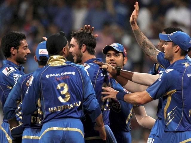 Mumbai Indians celebrate Faulkner's dismissal during the match against Rajastan Royals in Mumbai. (PTI Photo)