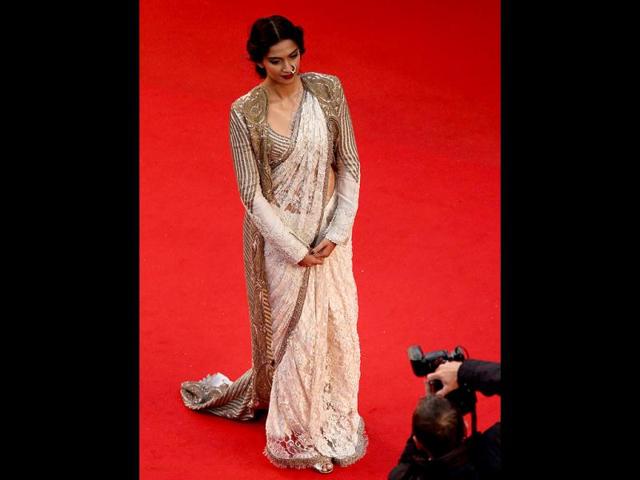Self-proclaimed fashionista and known for her style statement in Bollywood, Sonam Kapoor is always praised for her unique quotient at the Cannes Film Festival. But this time is the diva looking a little off? (AFP Photo)