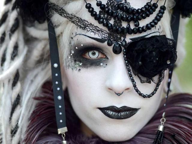 A visitor of a Wave-Gothic meeting poses for a photo in Leipzig, eastern Germany. AFP