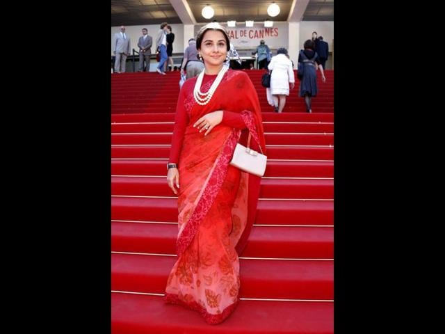 Vidya merges right in with the red carpet. We didn't miss the grandma pearls though.
