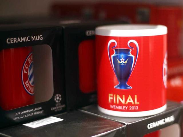 FC Bayern Munich mugs called "Final 2013" are displayed for sale in a fan shop in Munich. Reuters