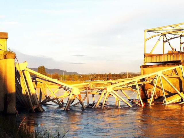 A portion of the Interstate 5 bridge is submerged after it collapsed into the Skagit River dumping vehicles and people into the water in Mount Vernon, Washington. AP Photo