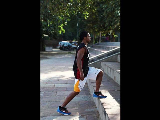 In step-ups, bring your right foot up with a jumping right when you take your left foot down to the ground. (Photo courtesy: Anil Chawla)