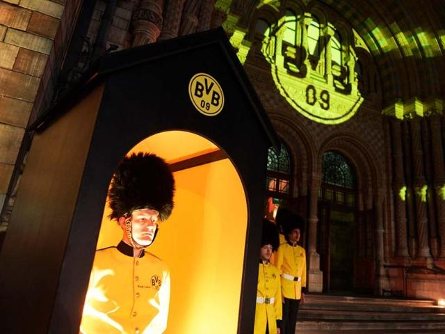 Actors in mock uniforms guard Borussia Dortmund's party at the Natural History Museum in London, England. Borussia Dortmund lost the Champions League final soccer match against FC Bayern Munich at Wembley stadium in London. (AP)