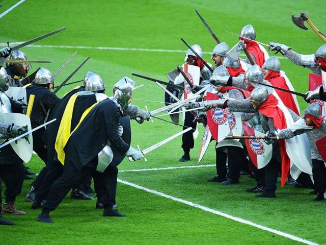 Performers dressed as medieval soldiers entertain during the opening ceremony of the UEFA Champions League final football match between Borussia Dortmund and Bayern Munich at Wembley Stadium in London. AFP Performers dressed as medieval soldiers entertain during the opening ceremony of the UEFA Champions League final football match between Borussia Dortmund and Bayern Munich at Wembley Stadium in London. AFP