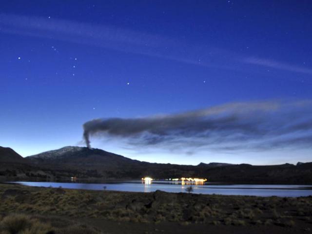 A plume of ash and smoke rise from the Copahue volcano, as seen from Caviahue, in the Argentine province of Neuquen. AP photo