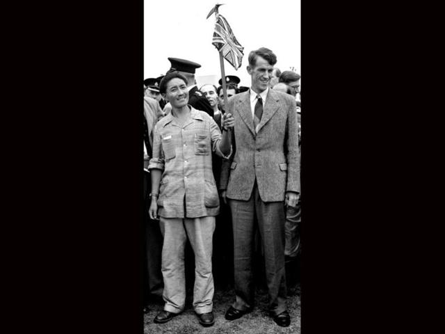 File photo: This black and white historical photograph dated July 3, 1953 shows Mount Everest conquerors Edmund Hillary (R) and Sherpa Tenzing Norgay (L) at London's Heathrow airport on their arrival from the expedition. AFP PHOTO