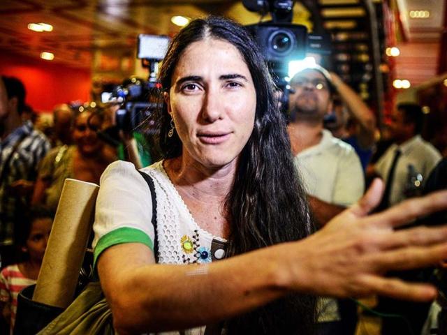 Cuban blogger Yoanis Sanchez arrives at Jose Marti airport in Havana. Yoanis toured by 13 countries where she spoke about the human rights situation in Cuba, specially referred to the internet access for all and democracy in the island. (AFP)
