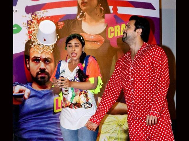 Looks like Emraan Hashmi, Vidya Balan were attacked with a bowl full of popcorn! Isn't that some appreciation for a movie? (PTI Photo)