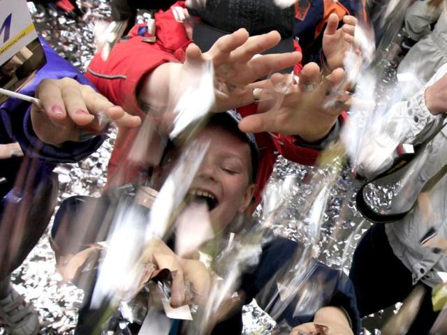 Children play during the Children's Carnival in the centre of Russia's Siberian city of Krasnoyarsk. Thousands of children, their relatives and teachers took part in the procession to celebrate International Children's Day. (Reuters)