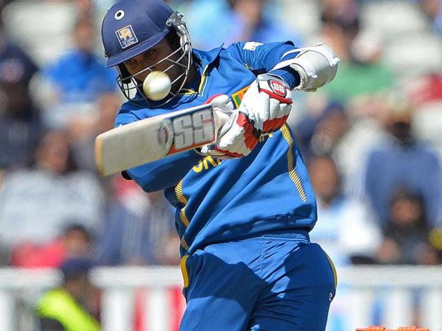 Sri Lanka's Dinesh Chandimal plays a shot during the warm-up cricket match ahead of the 2013 ICC Champions Trophy between India and Sri Lanka at Edgbaston in Birmingham. AFP/Andrew Yates