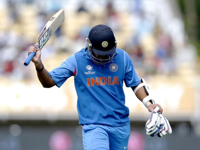India's Virat Kohli reacts as he walks off the crease after being caught by Sri Lanka's Shaminda Erange during their ICC Champions Trophy warm-up cricket match at Edgbaston cricket ground in Birmingham. AP/Sang Tang
