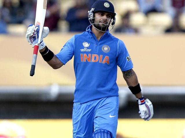 India's Virat Kohli reacts to his century he got against Sri Lanka during their ICC Champions Trophy warm-up cricket match at Edgbaston cricket ground in Birmingham, England. AP/Sang Tan