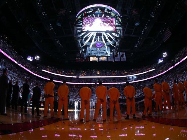 The Indiana Pacers stand on the court for the performance of ht enational ANthem against the Miami Heat during Game Seven of the Eastern Conference Finals of the 2013 NBA Playoffs at AmericanAirlines Arena in Miami, Florida. (AFP)