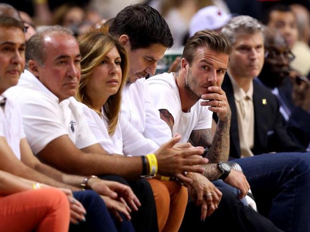David Beckham sits courtside as he watches the Miami Heat play against the Indiana Pacers during Game Seven of the Eastern Conference Finals of the 2013 NBA Playoffs at American Airlines Arena in Miami, Florida. (AFP)